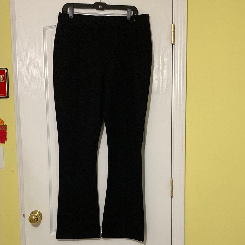 Flared cut, stretch fabric pants.